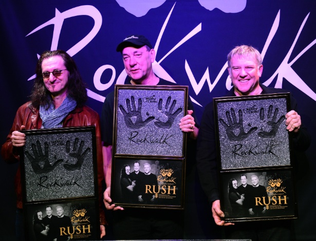 Rush Geddy Lee, Neil Peart, Alex Lifeson, integrantes do Rush, participam de festa da Guitar Center (20/11/12) - Brainpix