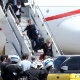 30.11.12 - Acompanhada pelos filhos Mercy e Rocco, Madonna desembarca no Rio de Janeiro para primeiro show da turnê "MDNA" no Brasil - AgNews