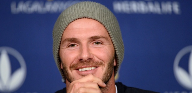 David Beckham sorri durante uma de suas últimas coletivas pelo LA Galaxy - Harry How/Getty Images/AFP
