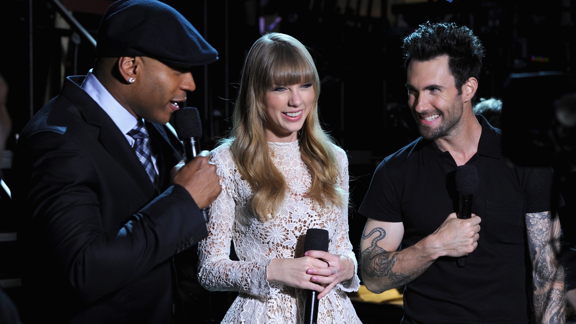 5.dez.2012 - LL Cool J, Taylor Swift e Adam Levine durante a cerimônia dos indicados ao Grammy 2013. A 55ª edição dos prêmios Grammy acontecerá no dia 10 de fevereiro no Staples Center, em Los Angeles - Getty Images