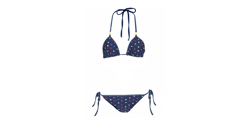 Biquíni Bambina em estilo cortininha, calcinha ajustável na lateral com estampa de estrelas da Cris Barros. R$ 248, na Shop2gether (www.shop2gether.com.br). Preços consultados em dezembro de 2012 e sujeitos a alterações - Divulgação