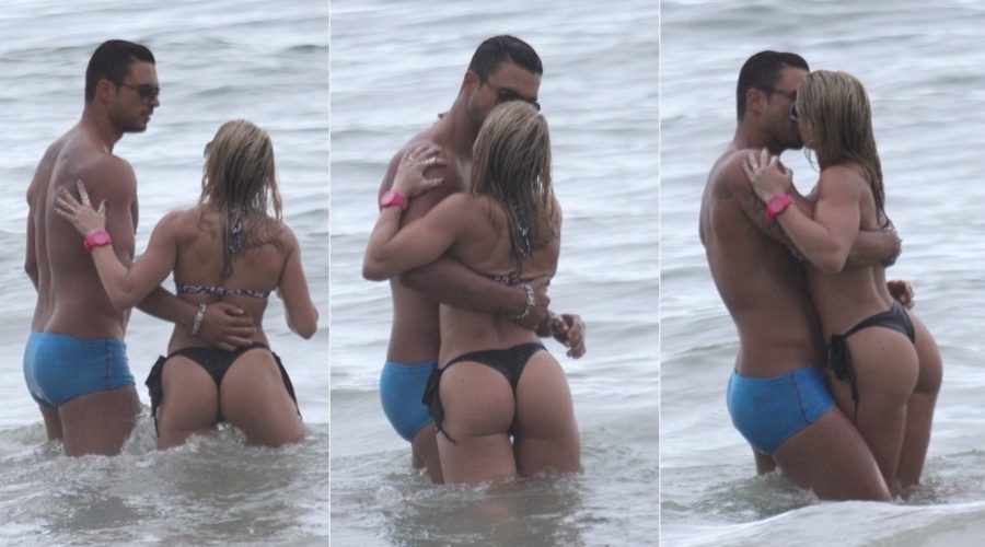 19.dez.2012 - Gustavo Salyer, ex-participante do programa "A Fazenda", trocou beijos com uma loira na praia de Ipanema, zona sul do Rio