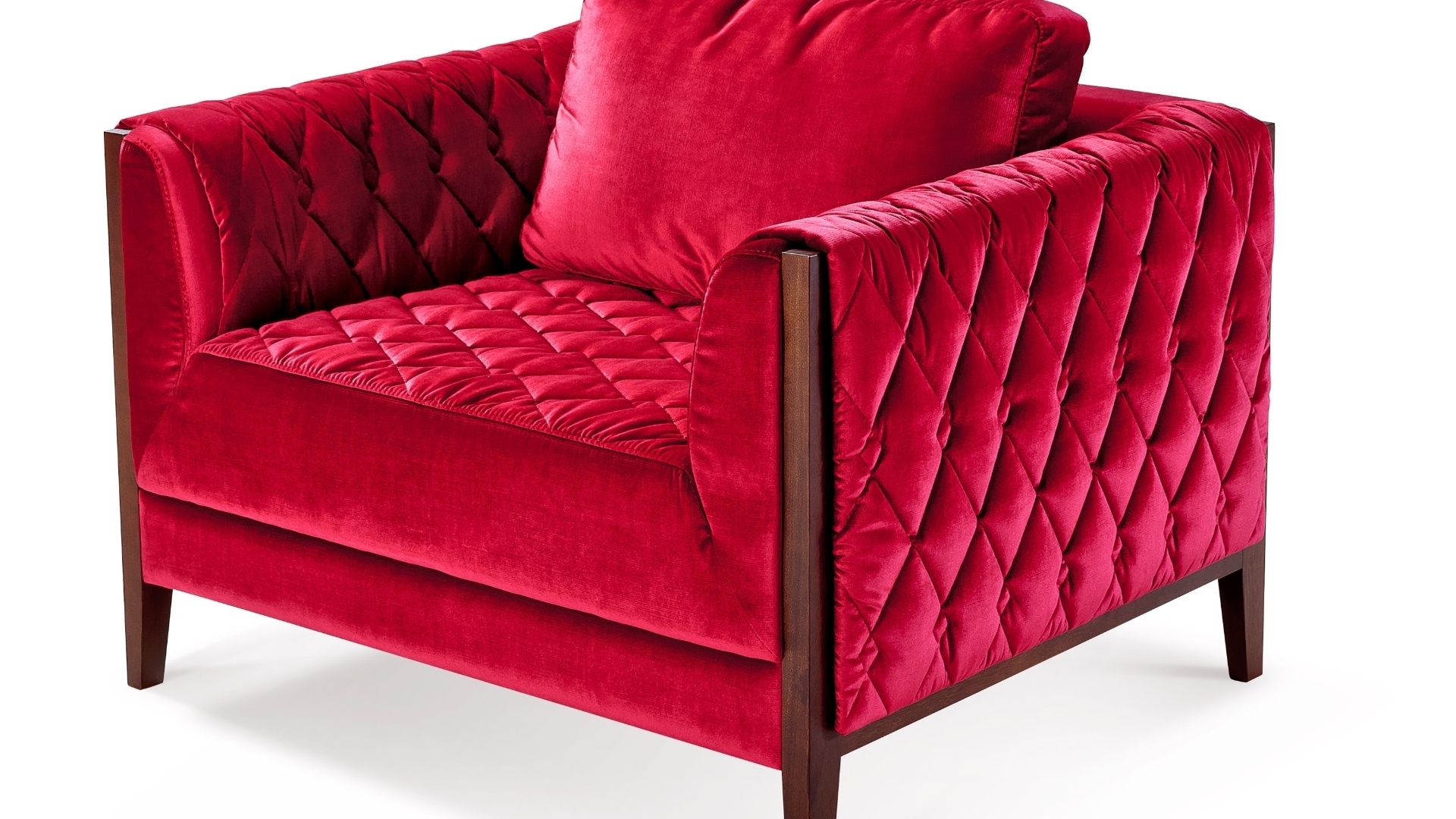 A poltrona Loa do Espaço Moveleiro (www.espacomoveleiro.com.br) tem detalhes de costura capitonê que deixa um volume losangular no assento e nos braços - Divulgação