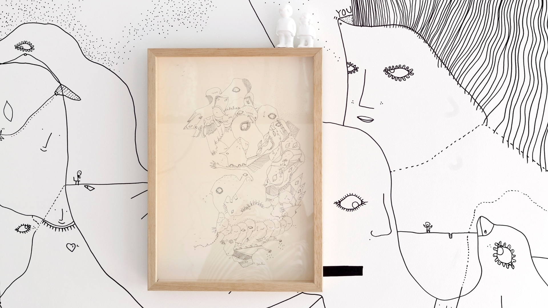 Sobre a parede desenhada, mais desenhos. A obra foi enquadrada para "que pudesse respirar" e se diferenciar dos demais grafismos (Imagem do NYT, usar apenas no respectivo material) - Trevor Tondro/ The New York Times