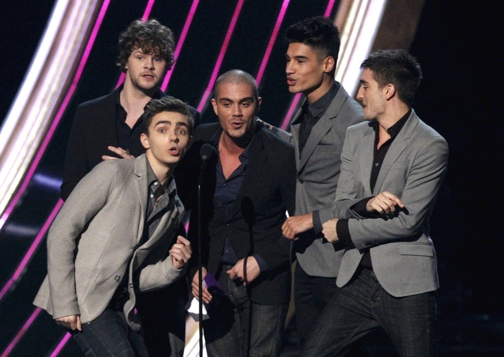 9.jan.2013 - Os integrantes da boy band The Wanted cantam ao receberem o prêmio de Melhor Artista Revelação na edição de 2013 do People's Choice Awards - Mario Anzuoni/Reuters