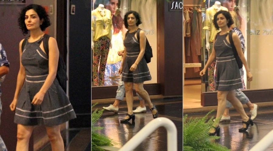 12.1.2013 - Com um vestido curto, a atriz Letícia Sabatella passeia em shopping no Rio
