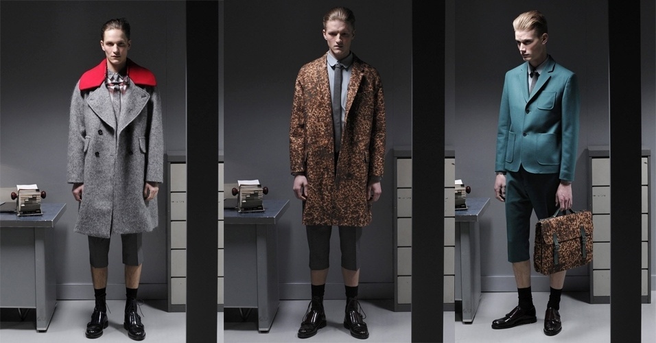16.jan.2013 - Se depender da Carven, os homens usarão calças curtas no próximo inverno. A marca apresentou os modelos usados com sapato, meia preta alta e casacos pesados. A cartela de cores misturava tons de cinza e preto com cores vivas - EFE