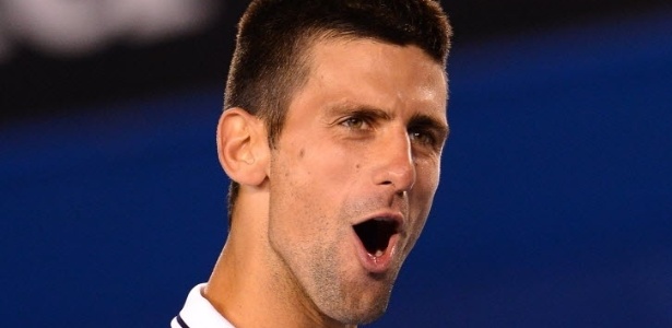 Djokovic assumiu "banho" com Hewitt e arrancou risadas do público - AFP PHOTO / WILLIAM WEST