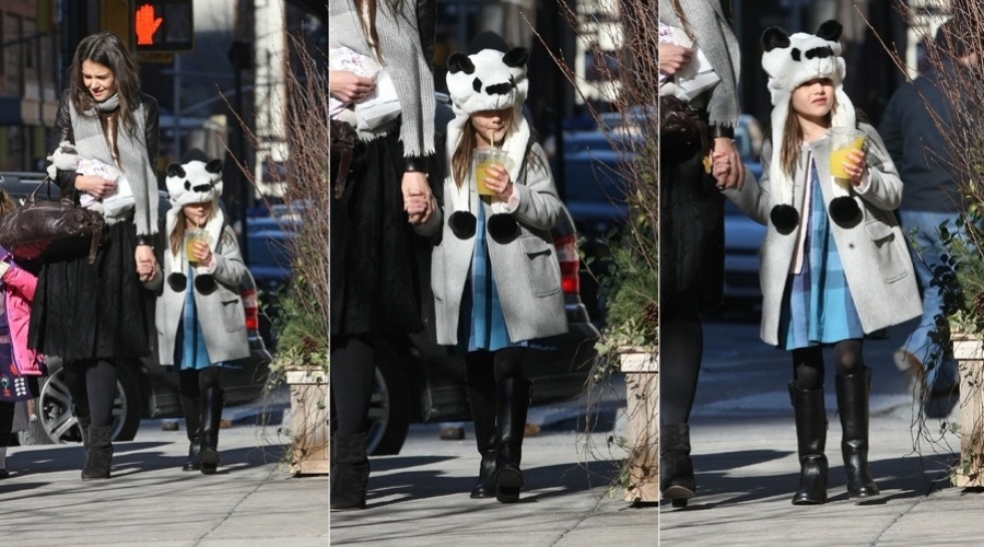 28.jan.2013 - Katie Holmes e a filha, Suri Cruise, passearam pelas ruas de Nova York. A menina de seis anos usou um chapéu de panda