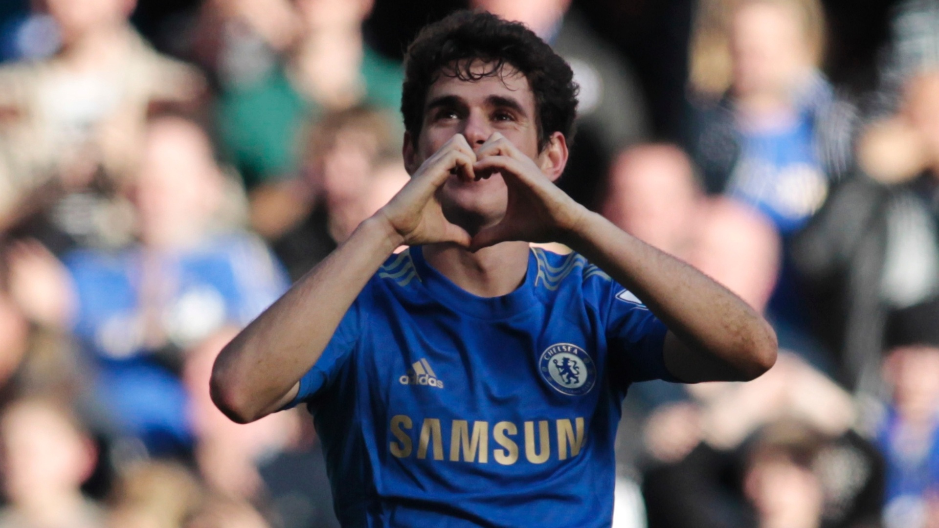17.fev.2013 - Brasileiro Oscar, do Chelsea, comemora seu gol na partida contra o Brentford, pela Copa da Inglaterra - AP Photo/Sang Tan