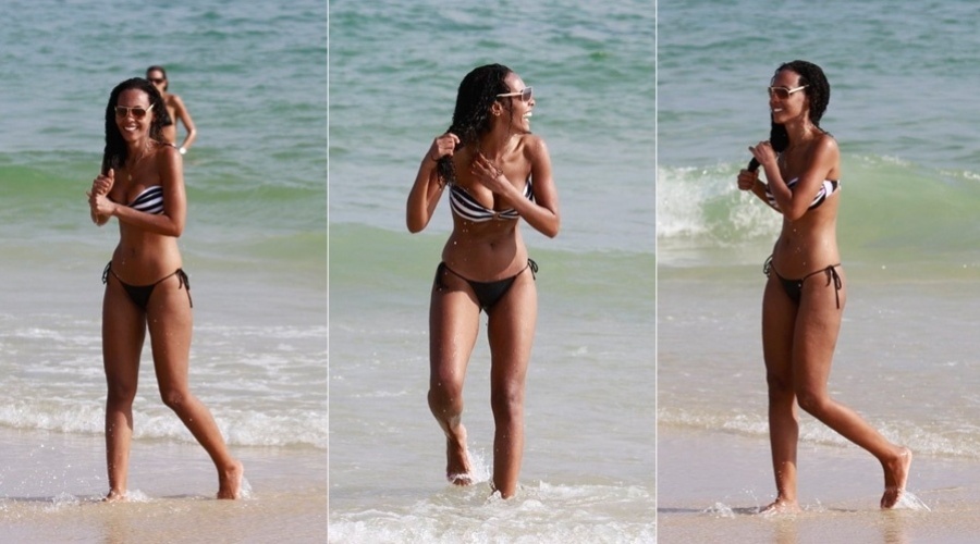 19.fev.2013 - A ex-BBB Aline curtiu a praia da Barra da Tijuca, zona oeste do Rio