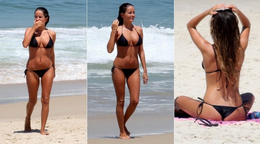 4.mar.2013 - Com um biquíni de lacinho preto, a atriz Érika Mader, sobrinha de Malu Mader, vai à praia de Ipanema, na zona sul do Rio