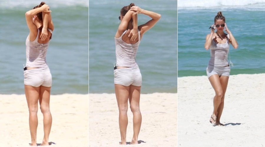 4.mar.2013 - A atriz Fernanda de Freitas exercita-se na praia da Barra, na zona oeste do Rio