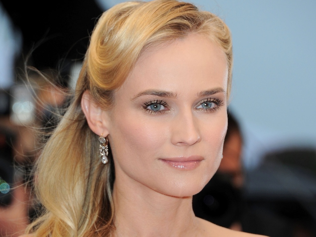 ROSTO RETANGULAR: A franja bagunçada garante volume na medida para harmonizar as formas do rosto da atriz Diane Kruger - Getty Images