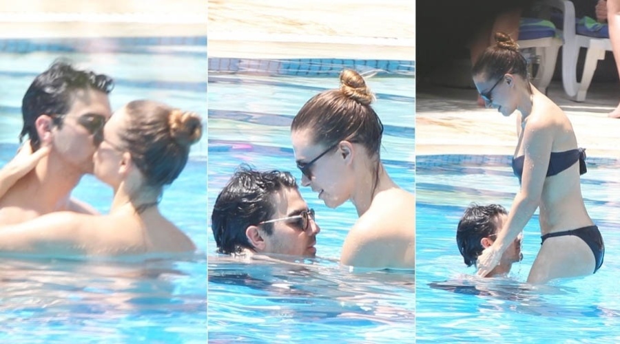 12.mar.2013 - Joe Jonas namora em piscina de hotel no Rio