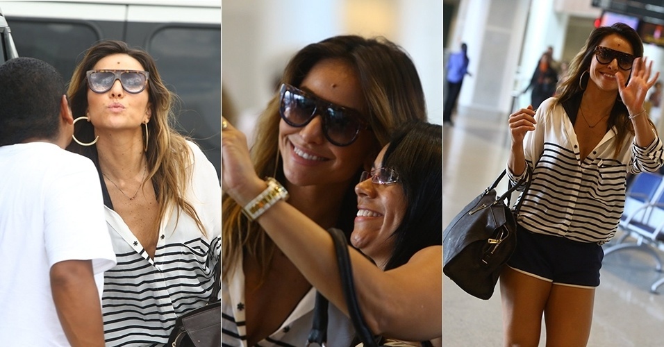 17.mar.2013 - Sabrina Sato mostra simpatia com fãs e paparazzi em aeroporto no Rio de Janeiro