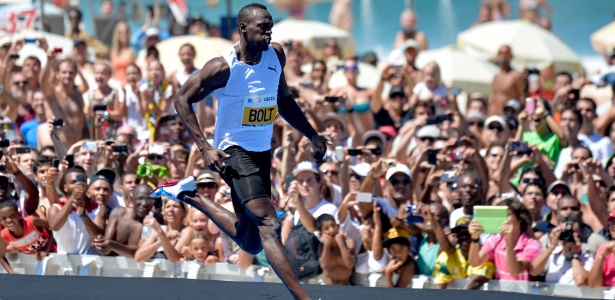 31.mar.2013 - Bolt vence desafio de 150m no Rio de Janeiro, mas sem bater recorde - Celso Pupo / Fotoarena