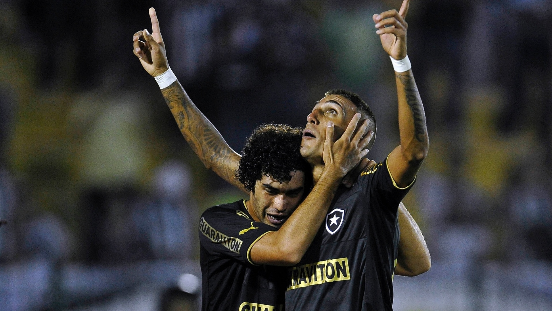 03.abr.2013 - Rafael Marques comemora após fazer gol pelo Botafogo no clássico contra o Vasco pela Taça Rio, em Volta Redonda - Fabio Castro/AGIF