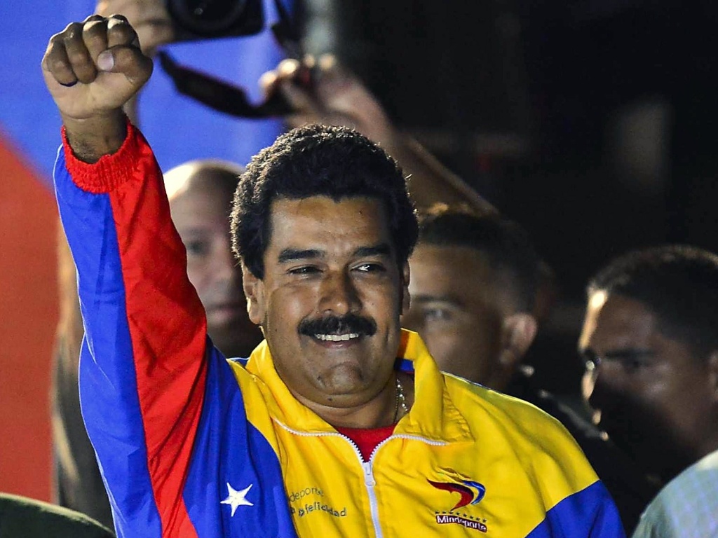 14.abr.2013 - Nicolás Maduro comemora após anúncio de sua vitória na eleição para a Presidência da Venezuela - Luis Acosta/AFP
