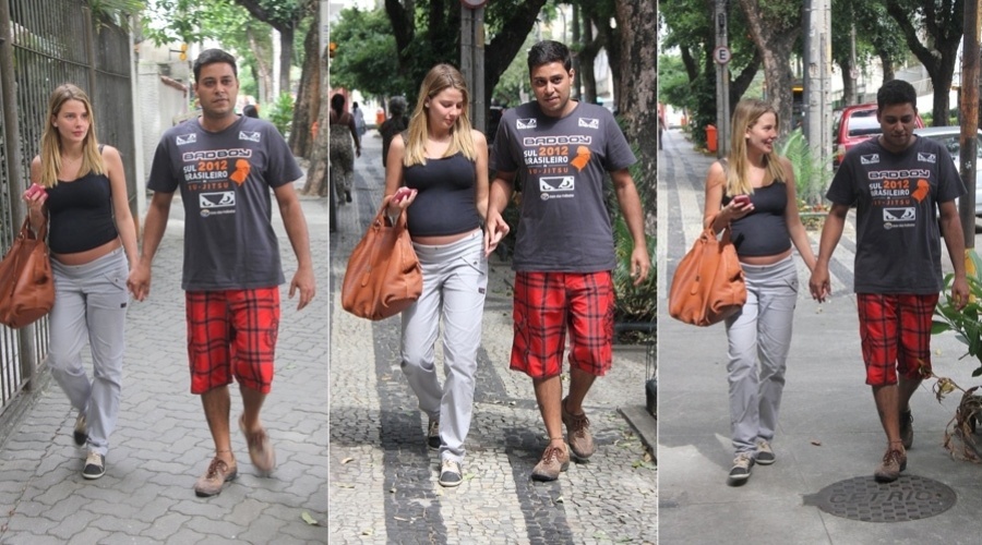 29.abr.2013 - Grávida de sete meses, Debby Lagranha visitou uma clínica na zona norte do Rio. A atriz estava acompanhada do marido, Leandro Franco