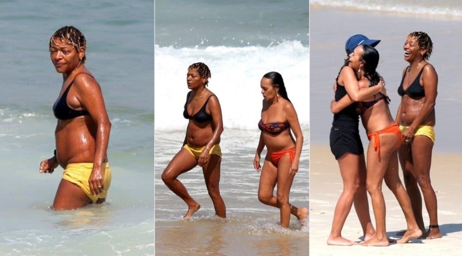 30.abr.2013 - De short, Mart'nália curtiu praia com amigas no Arpoador, zona sul do Rio. A cantora está no ar em "Pé na Cova"