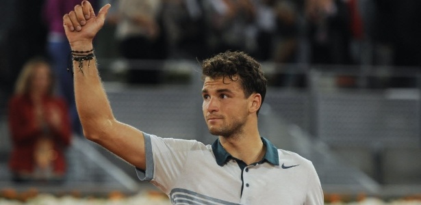 Búlgaro Grigor Dimitrov comemora vitoria sobre o sérvio Novak Djokovic no Masters de Madri - Dominique Faget/AFP