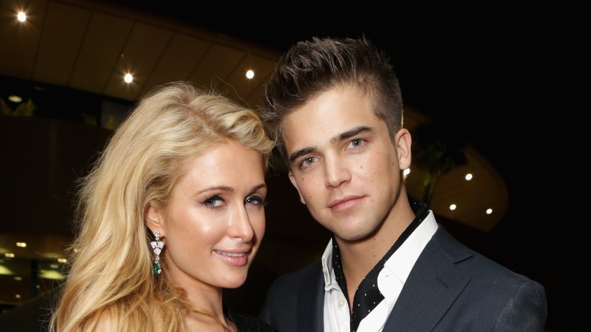 18.mai.2013 - Paris Hilton e o namorado, River Viiperi, vão a festa durante o Festival de Cannes - Tiffany Rose/Getty Images