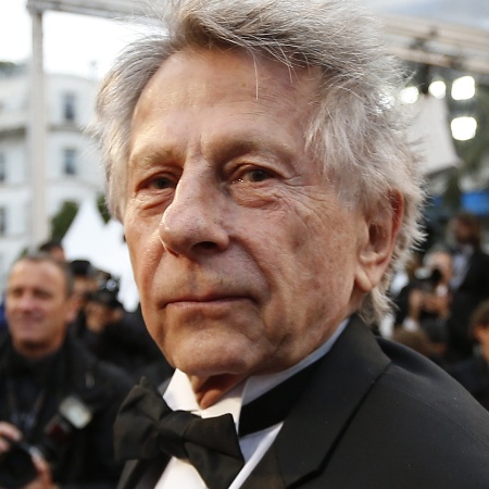 22.mai.2013 - O diretor franco-polonês Roman Polanski chega para sessão especial de "Week-end de um Campeão", filme de 1972 dirigido por ele - Valery Hache/AFP