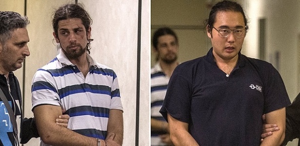 Rafael Marques Lusvargh (à esq.) e Fabio Hideki Harano foram presos após protesto anti-Copa na av. Paulista - Avener Prado/Folhapress