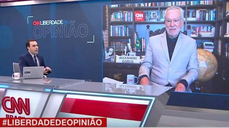 Rafael Colombo discute com Alexandre Garcia, ao vivo, na CNN, em junho de 2021 - Reprodução/CNN - Reprodução/CNN