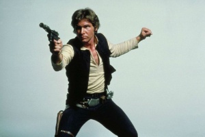 Harrison Ford como Han Solo, com sua pistola, em "Star Wars" - Reprodução