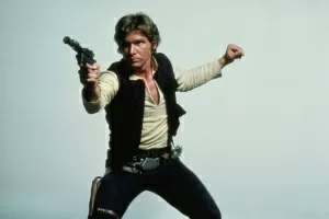 Harrison Ford como Han Solo, com sua pistola, em "Star Wars" - Reprodução