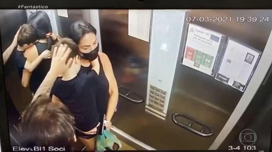7.mar.2021 - Câmeras de segurança mostraram Jairinho, Monique e Henry no elevador após o menino ser entregue pelo pai, Leniel Borel - Reprodução/TV Globo