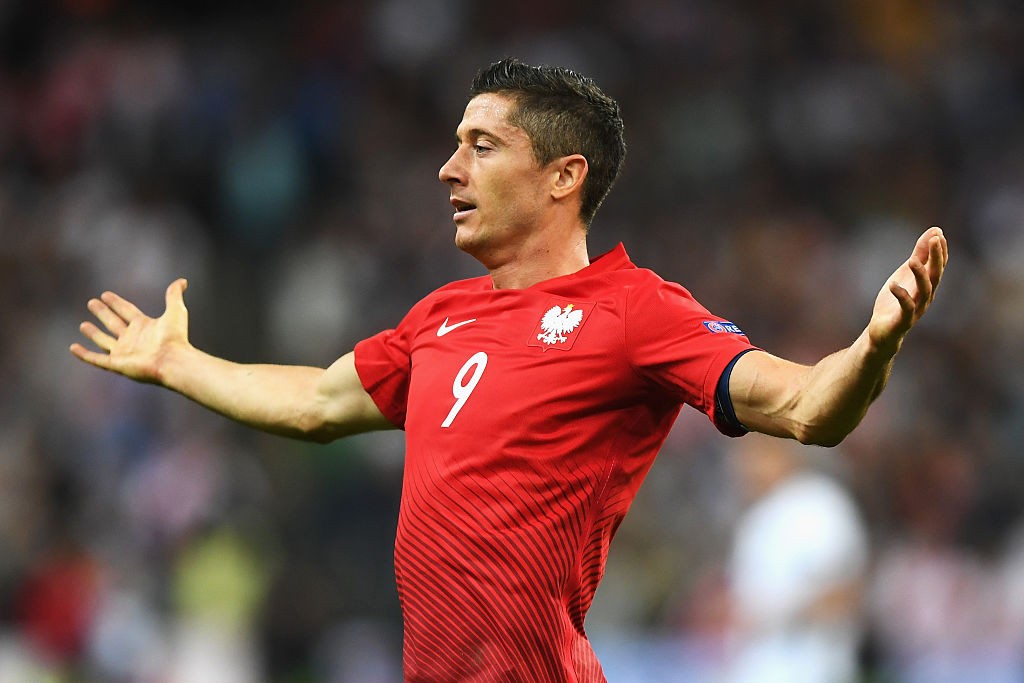 PARIS, FRANCE - JUNE 16: Robert Lewandowski of Poland reacts during the UEFA EURO 2016 Group C match between Germany and Poland at Stade de France on June 16, 2016 in Paris, France. (Photo by Shaun Botterill/Getty Images)
