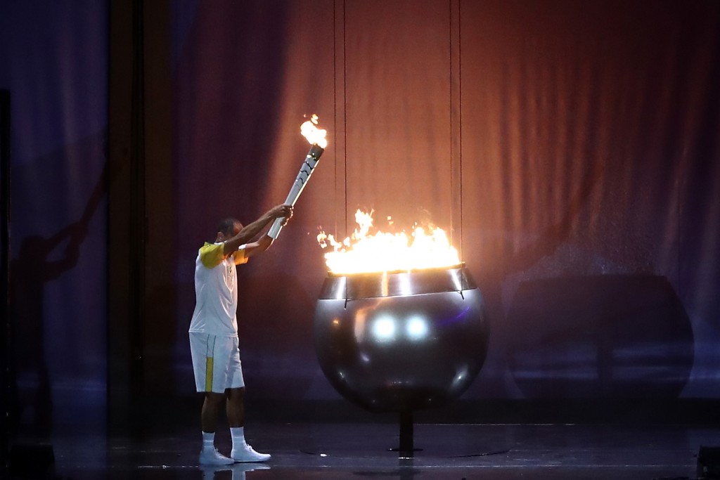 RIO DE JANEIRO, BRAZIL - AUGUST 05: The Olympic Cauldron is lit by the final torch bearer and former marathon runner Vanderlei Cordeiro de Lima during the Opening Ceremony of the Rio 2016 Olympic Games at Maracana Stadium on August 5, 2016 in Rio de Janeiro, Brazil. (Photo by David Rogers/Getty Images)