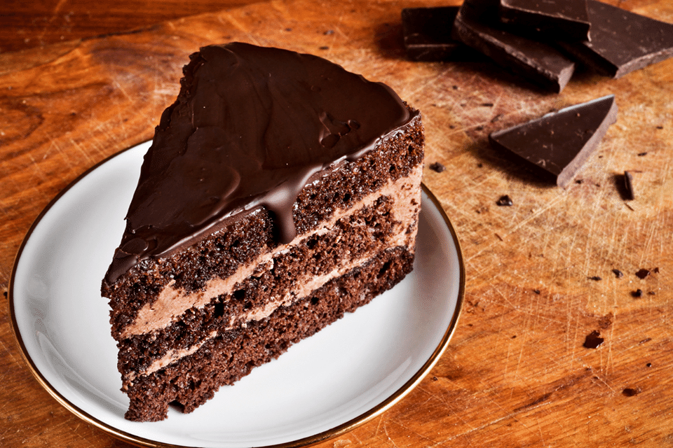 Bolo De Chocolate Doce Comida. Jogo Cremoso Do Queque