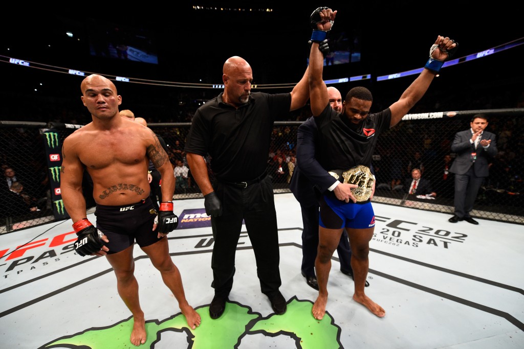 ATLANTA, GA - JULY 30: (R-L)Tyron Woodley celebrates his knockout victory over Robbie Lawler in their welterweight championship bout during the UFC 201 event on July 30, 2016 at Philips Arena in Atlanta, Georgia. (Photo by Jeff Bottari/Zuffa LLC/Zuffa LLC via Getty Images)