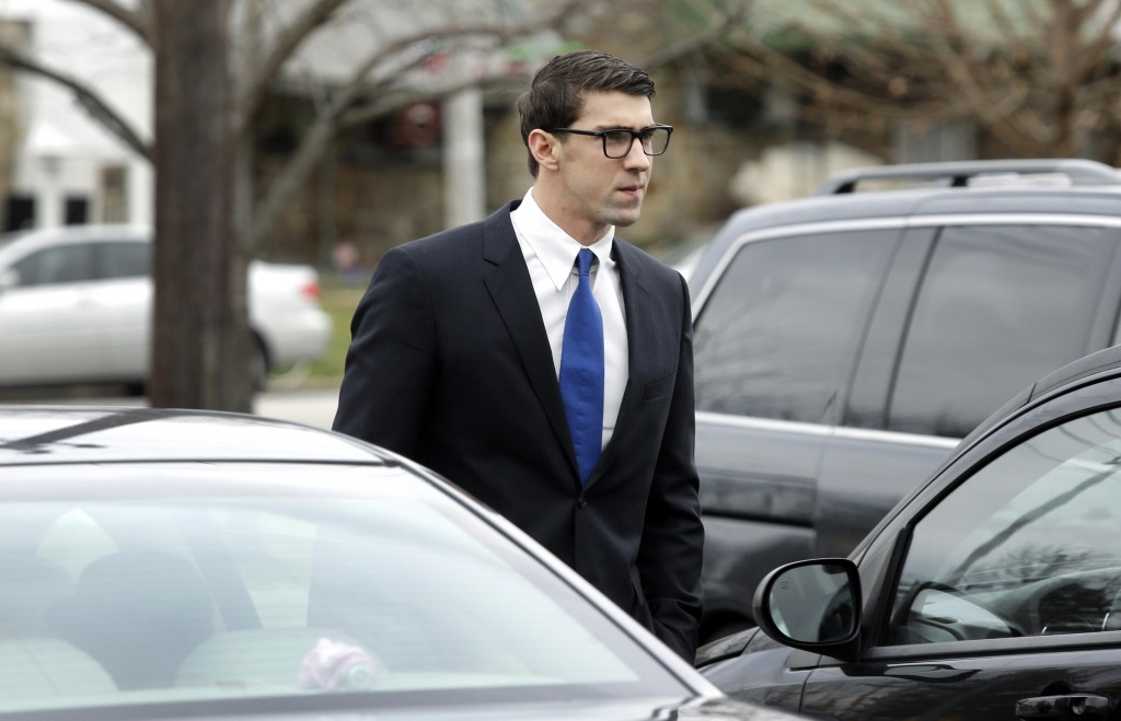 Phelps chega a tribunal onde foi condenado a 18 meses de condicional - Foto: Washington Times
