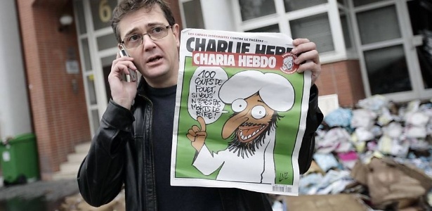 Foto de 2011 mostra o diretor da revista, Stéphane Charbonnier, conhecido como Charb - Alexander Klein/AFP