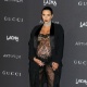 7.nov.2015 - Kim Kardashian, que está grávida de 8 meses de seu segundo filho, exibiu um figurino transparente bem ousado no tapete vermelho do LACMA Art + Film, em Los Angeles, nos EUA - AKM/GSI