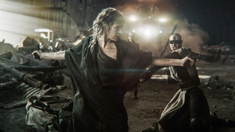 Milla como a feiticeira Gray Arys em 'Nas Terras Perdidas' Milla como a feiticeira Gray Arys em 'Nas Terras Perdidas'