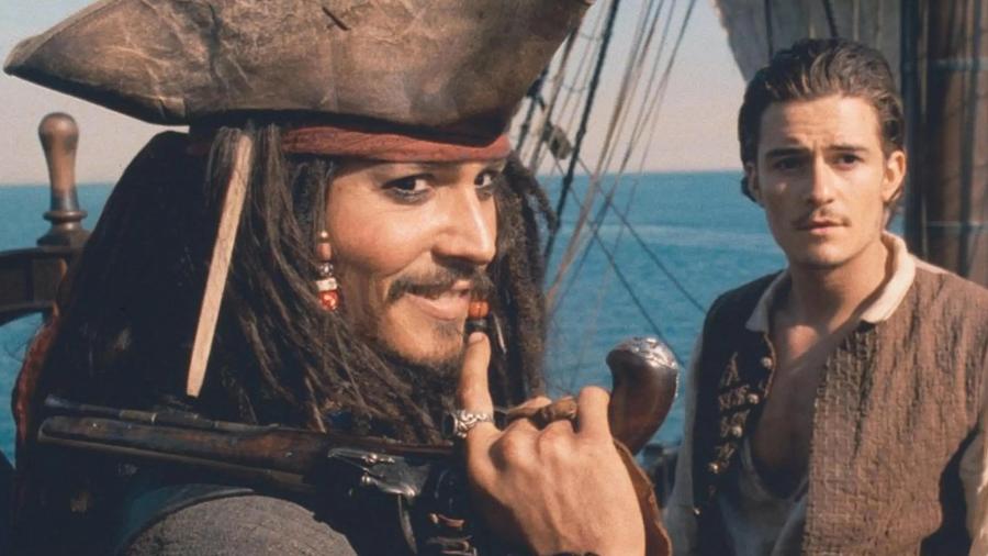 Johnny Depp e Orlando Bloom em "Piratas do Caribe" - Disney