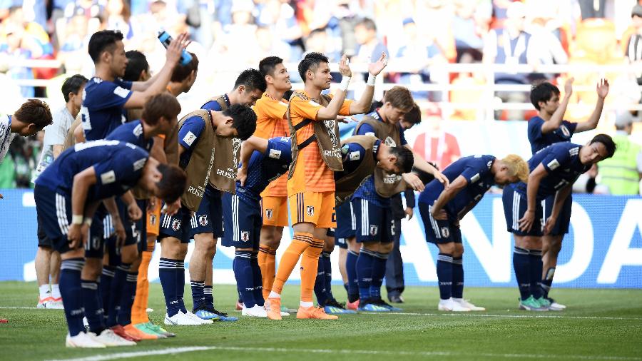 Jogadores do Japão agradecem a torcida após vitória sobre a Colômbia - Carl Court/Getty Images