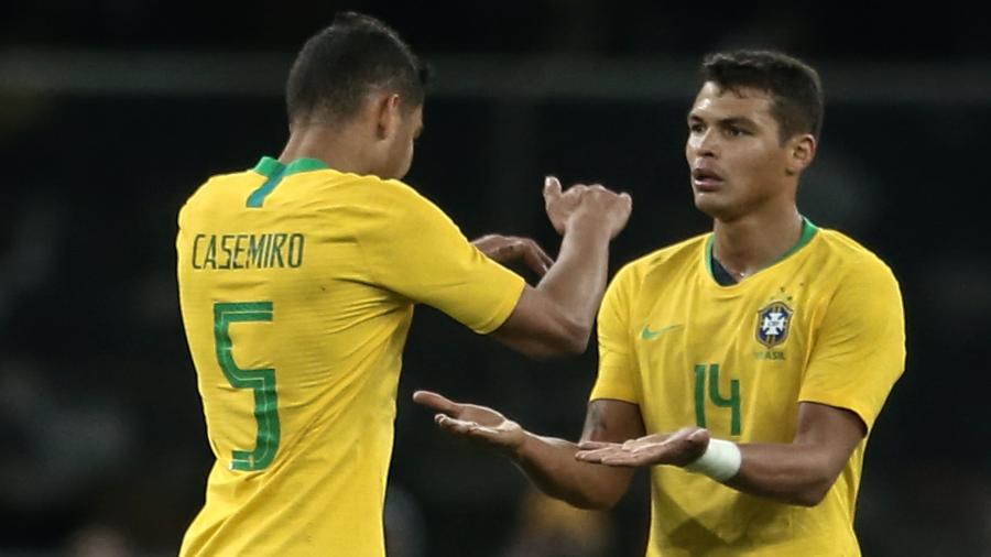 Uniforme seleção amarelo (Casemiro e Thiago Silva) - Pedro Martins/MoWA Press