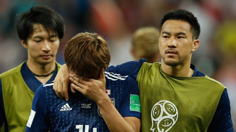 Inui e Okazaki, do Japão, após eliminação na Copa do Mundo - Odd Andersen/AFP