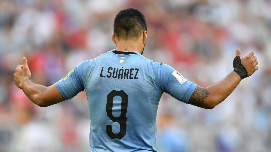 Luis Suárez foi um dos destaques do Uruguai na primeira fase da Copa - AFP PHOTO / Fabrice COFFRINI