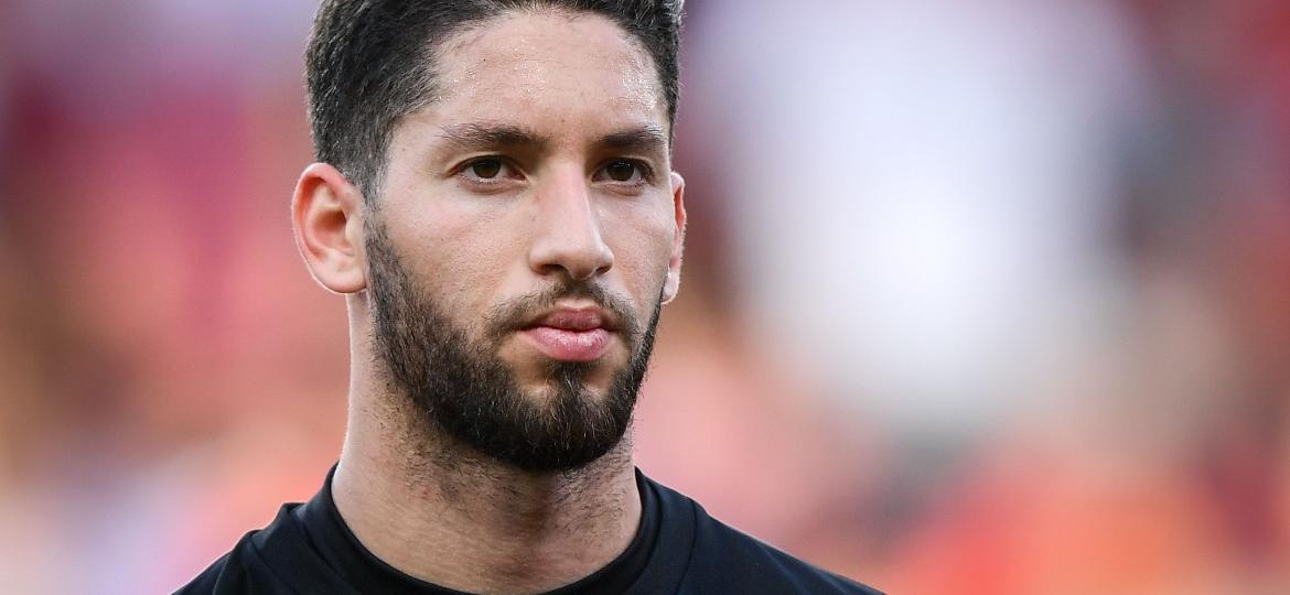 Mouez Hassen (foto) negou ter fingido uma lesão; técnico tunisiano afirmou que a "paradinha" fez parte da estratégia - Fabrice Coffrini/AFP