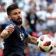 Olivier Giroud, da França, disputa bola no ar com Nicolás Tagliafico, da Argentina - Julio Muñoz/EFE
