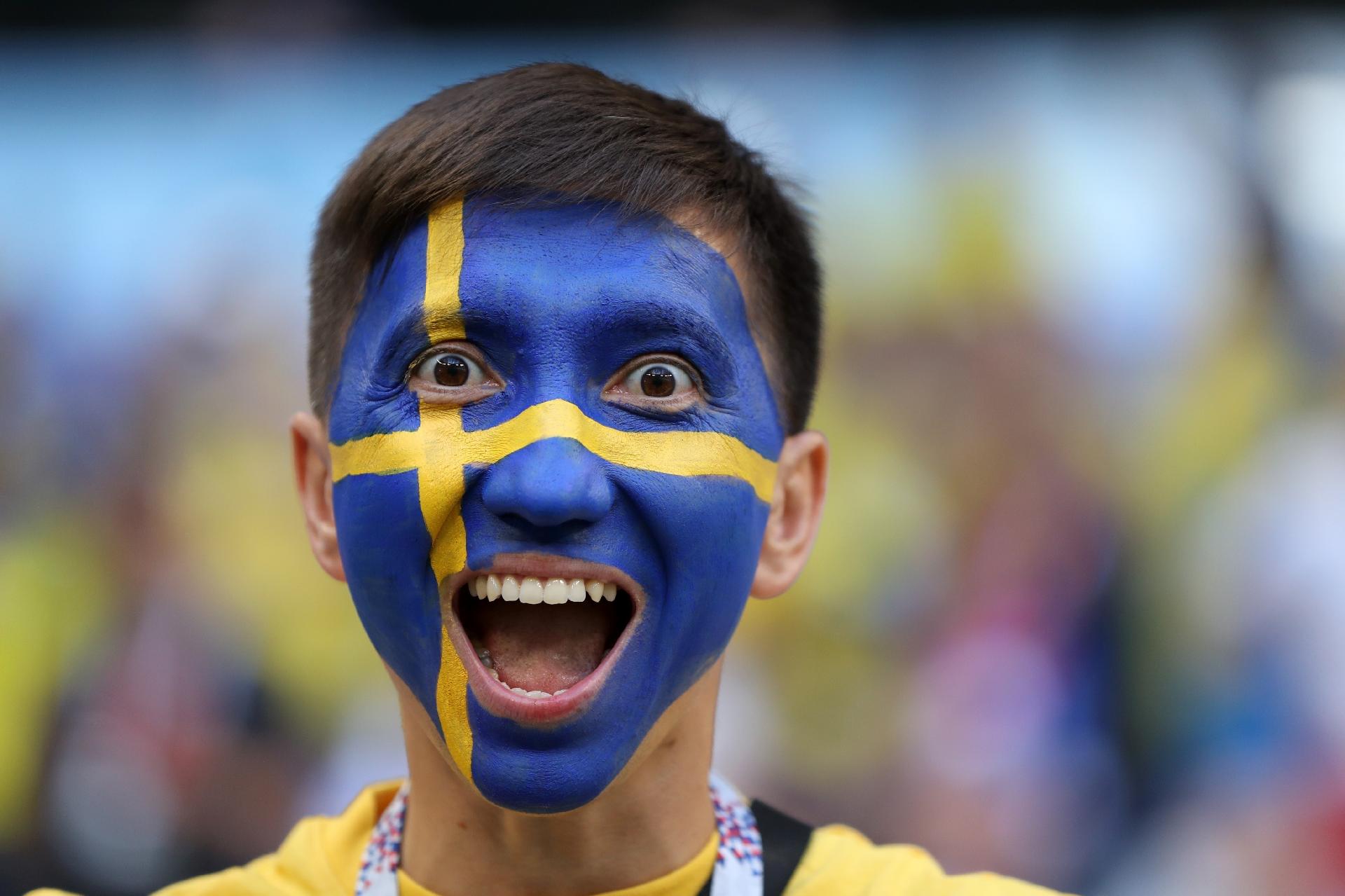 Torcedor com a bandeira da Suécia pintada no rosto - Ryan Pierse/Getty Images