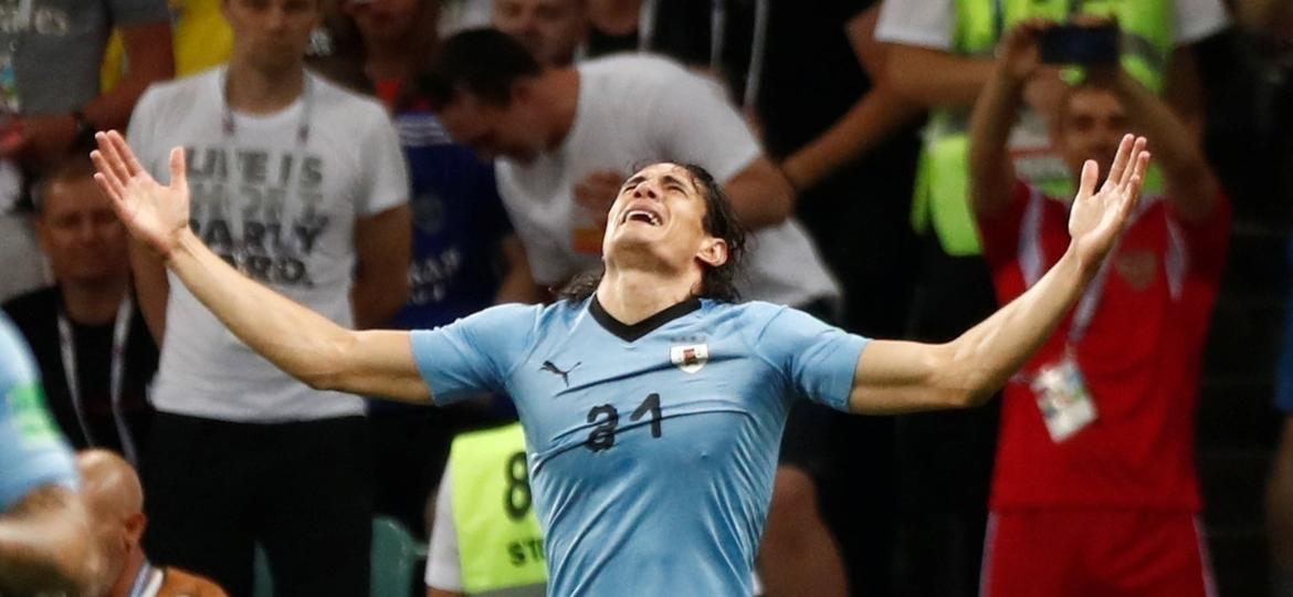 O atacante Edinson Cavani comemora depois de marcar gol e abrir o placar entre Portugal e Uruguai - REUTERS/Murad Sezer